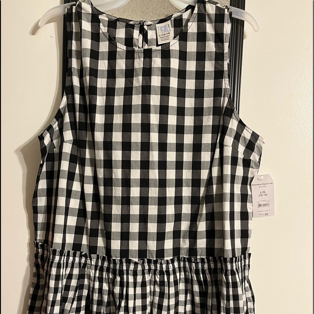 Sleeveless Peplum Top